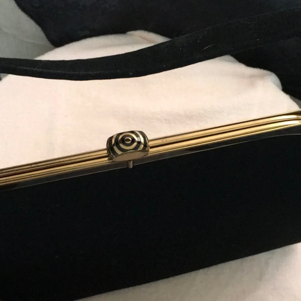 Classic Black Velvet Evening handbag with Gold Accent with fabric lining.